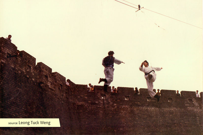 Duelling ancient swordsmen on cables at Tang Dynasty City