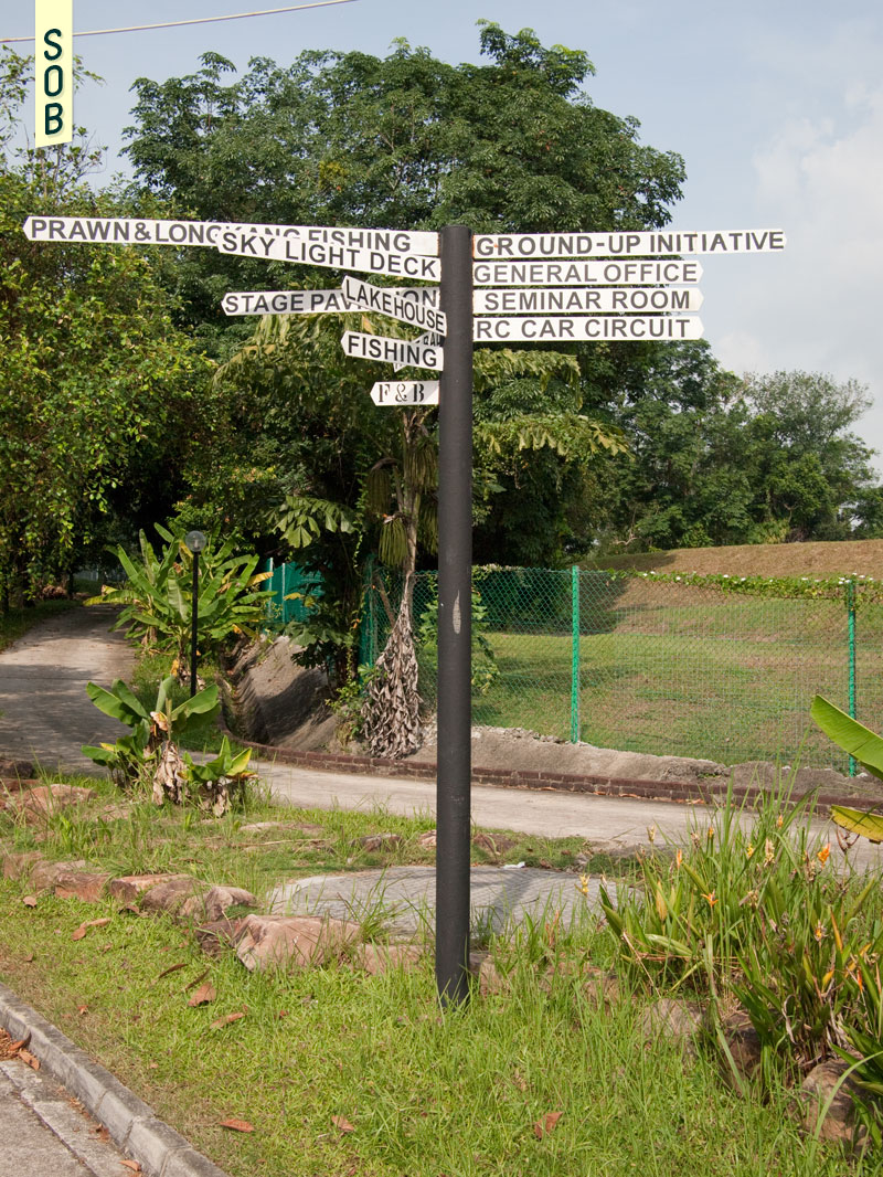Directional signboard at Bottle Tree Park